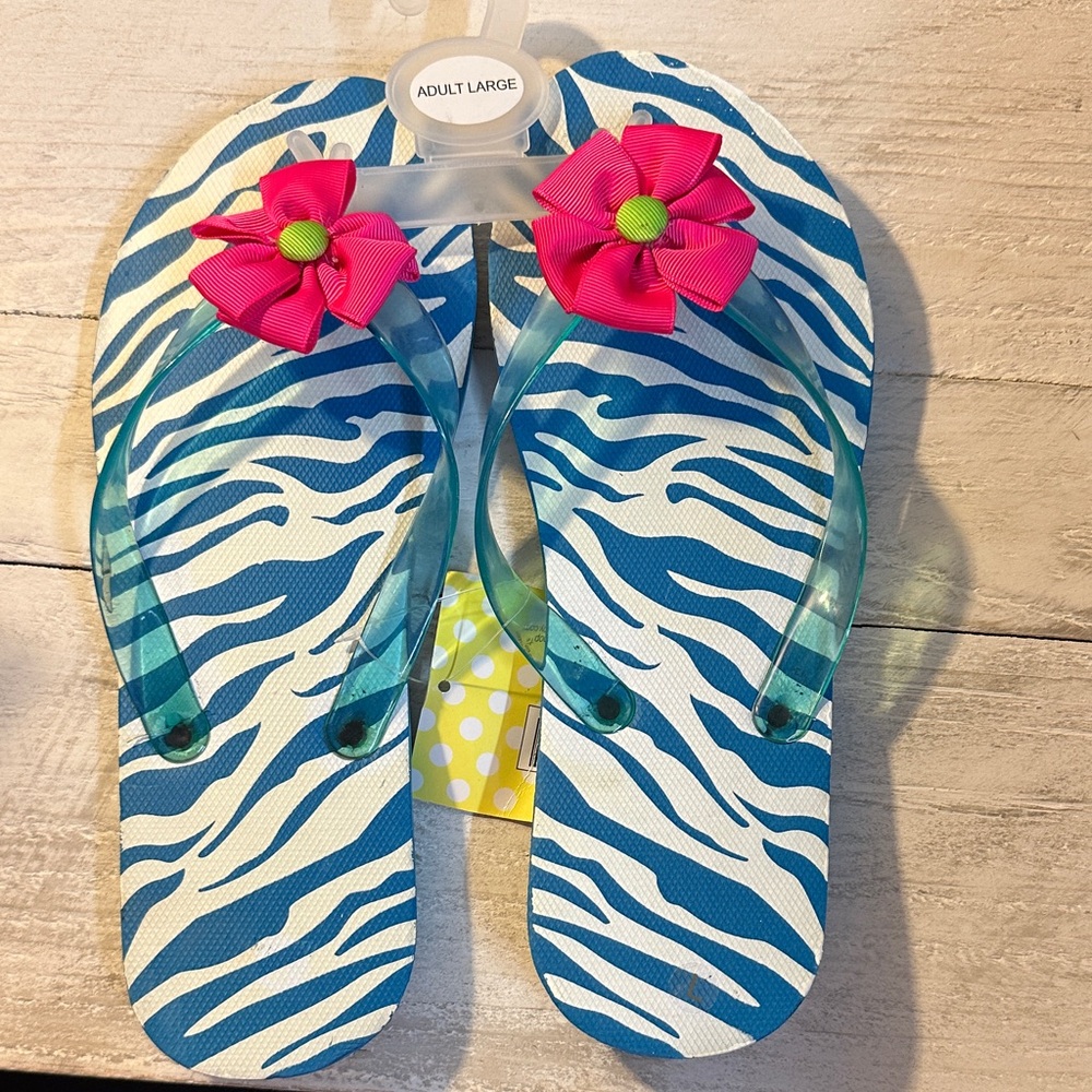 The Spring Shop Blue Zebra Flip Flops with Pink Flower